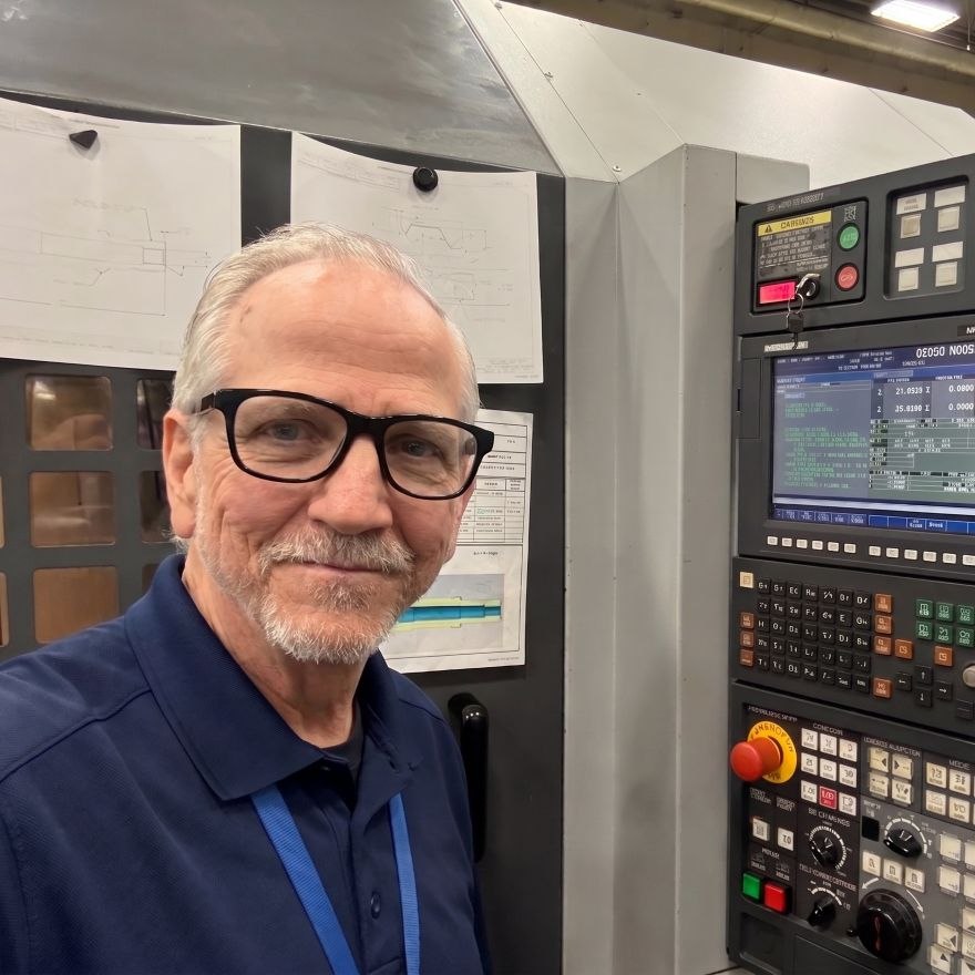 Bob Foster, founder of CNC Guy, at a DMG Mori MSX-500III lathe control